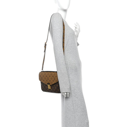 Reverse Monogram Pochette Metis Handbag