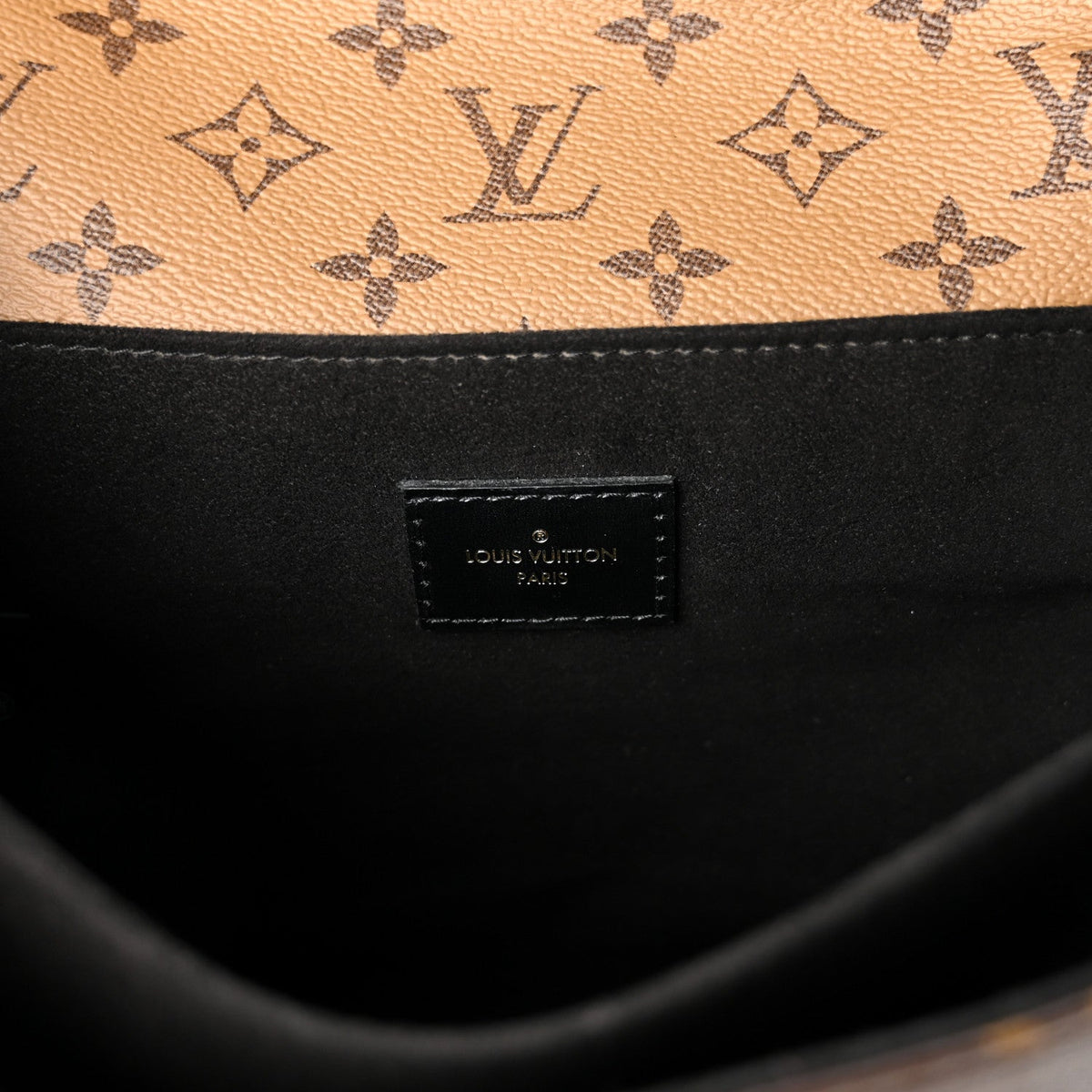 Reverse Monogram Pochette Metis Handbag