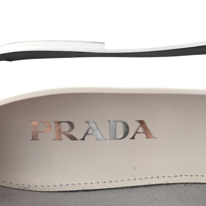 Prada Spazzolato Metal Triangle Logo 20mm Women's Loafers White