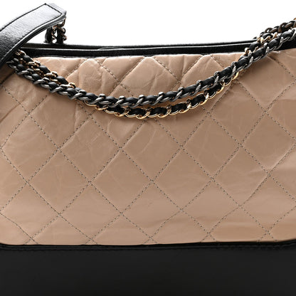 Medium Quilted Calfskin Hobo Bag - Beige