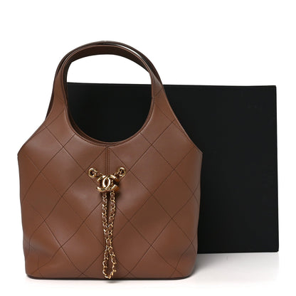 Small Quilted Calfskin Handbag - Brown