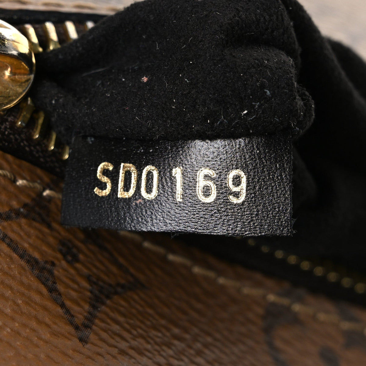Reverse Monogram Pochette Metis Handbag